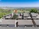 Aerial view of home highlighting the community's layout, showing its location and surroundings with mountain view at 6980 Fargo Trl, Littleton, CO 80125