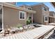 Inviting townhome featuring a covered entry and xeriscaping at 6980 Fargo Trl, Littleton, CO 80125
