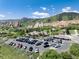 Extensive parking lot with a gorgeous view of the surrounding mountains and golf course at 6980 Fargo Trl, Littleton, CO 80125