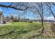 Spacious backyard featuring a shed and lush green lawn, offering plenty of space for recreation and outdoor activities at 7240 S Cherry Dr, Centennial, CO 80122