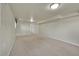 Finished basement with carpet flooring and white walls at 7240 S Cherry Dr, Centennial, CO 80122