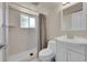 Bathroom with shower and tub combo and white vanity at 7240 S Cherry Dr, Centennial, CO 80122