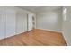 Comfortable bedroom with hardwood floors and ample closet space at 7240 S Cherry Dr, Centennial, CO 80122