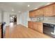 Bright kitchen with wooden cabinets and granite countertops at 7240 S Cherry Dr, Centennial, CO 80122