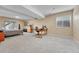 Finished basement bedroom with carpet, walkout, and desk space at 10233 Greatwood Ct, Highlands Ranch, CO 80126
