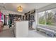 Large walk-in closet with center island, custom shelves and bright lighting at 10233 Greatwood Ct, Highlands Ranch, CO 80126