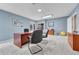 Finished basement office space with backyard views and plush carpet at 10233 Greatwood Ct, Highlands Ranch, CO 80126