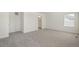 Carpeted bedroom with en-suite bathroom access at 15963 Syracuse St, Thornton, CO 80602