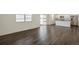 Open concept kitchen with stainless steel appliances and granite countertops at 15963 Syracuse St, Thornton, CO 80602