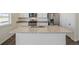 Granite countertop kitchen island with sink at 15963 Syracuse St, Thornton, CO 80602