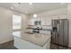 Kitchen features granite countertops and stainless steel appliances at 15963 Syracuse St, Thornton, CO 80602