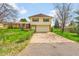 Charming two-story home featuring a large front yard, attached garage and beautiful curb appeal at 8204 S Cody St, Littleton, CO 80128