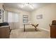 Versatile room featuring a sewing machine on a table, with bright lighting and neutral walls, ideal for a home office at 18067 E Anthem Dr, Parker, CO 80134