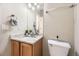 Cozy bathroom with vanity, granite countertop, updated fixtures, and a neutral color palette at 16534 E Fire Fly Ave, Parker, CO 80134