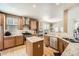 Spacious kitchen featuring stainless steel appliances, granite countertops, and an island at 16534 E Fire Fly Ave, Parker, CO 80134
