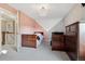 Cozy bedroom with unique wall design, two beds, carpet floors and a chandelier at 15218 W La Salle Ave, Lakewood, CO 80228