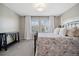 Bedroom with lots of natural light, a decorative bed frame and a neutral color palette at 15218 W La Salle Ave, Lakewood, CO 80228