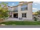 Exterior home image displays a well-kept lawn and patio area, offering outdoor living at 15218 W La Salle Ave, Lakewood, CO 80228