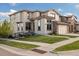 Charming two-story home featuring a well manicured lawn and a two car garage at 15218 W La Salle Ave, Lakewood, CO 80228