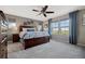 Spacious main bedroom with plush carpeting, large windows, and stylish decor at 15218 W La Salle Ave, Lakewood, CO 80228