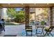 Covered patio boasts an outdoor dining area with backyard views at 15218 W La Salle Ave, Lakewood, CO 80228