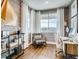 Bright home office with built-in shelving and large window with a view at 4616 Girardot Pt, Castle Rock, CO 80104