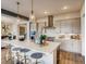 Modern kitchen with white quartz countertops and stainless steel appliances at 4616 Girardot Pt, Castle Rock, CO 80104