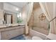 Cozy bathroom with tile flooring, a shower, and bath at 9142 Warriors Mark Dr, Franktown, CO 80116