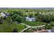 Beautiful aerial view of the lake, surrounded by lush greenery at 13560 Detroit St, Thornton, CO 80241