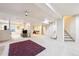 Spacious finished basement with ample lighting, carpet flooring, and versatile layout, perfect for recreation and relaxation at 13560 Detroit St, Thornton, CO 80241