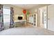 Bright bedroom featuring a desk, shelving, and playful Dr. Seuss-inspired wall decor creating a fun, creative space at 13560 Detroit St, Thornton, CO 80241