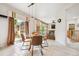 Bright eat-in kitchen featuring a sliding glass door with backyard views at 13560 Detroit St, Thornton, CO 80241