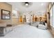 Spacious living area with staircase offers an open layout, perfect for entertaining and comfortable living at 13560 Detroit St, Thornton, CO 80241