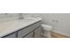 Clean bathroom with single vanity and toilet at 487 Interlocken Blvd # 407, Broomfield, CO 80021