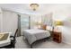 Bedroom featuring carpet, a chandelier, and white walls at 5185 W Fair Pl, Littleton, CO 80123