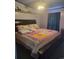 Bedroom with bed, storage and soft lighting at 313 W 3Rd Ave, Byers, CO 80103