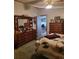 Bedroom with ceiling fan, dresser and closet for storage at 313 W 3Rd Ave, Byers, CO 80103