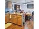 Kitchen island and adjoining dining area at 313 W 3Rd Ave, Byers, CO 80103