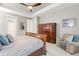 Spacious main bedroom with elegant furnishings and comfortable sitting area, perfect for relaxation at 18922 W 84Th Ave, Arvada, CO 80007