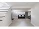 Finished basement with plush carpeting, neutral walls, and comfortable seating at 2995 N Cherry St, Denver, CO 80207