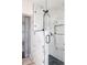 Luxurious bathroom featuring an oversized marble shower, contemporary fixtures, and modern design at 2995 N Cherry St, Denver, CO 80207