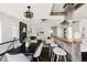 Stylish dining area connected to the living room and kitchen, perfect for modern living and entertaining guests at 2995 N Cherry St, Denver, CO 80207