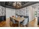 Dining room showcasing a decorative ceiling, chandelier, and comfortable seating at 10546 Sundial Rim Rd, Highlands Ranch, CO 80126