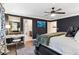 Elegant main bedroom with dark walls and a dedicated vanity area, offering a relaxing retreat at 10546 Sundial Rim Rd, Highlands Ranch, CO 80126