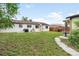 Spacious backyard with a patio area, ideal for outdoor dining and entertaining at 4972 W Custer Pl, Denver, CO 80219