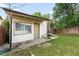 Detached outbuilding featuring a patio and garden view at 4972 W Custer Pl, Denver, CO 80219
