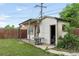 Outbuilding with covered patio and ample storage space, adding functionality to the property at 4972 W Custer Pl, Denver, CO 80219