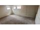 Finished basement room with carpeted floors, and natural light from above ground windows at 3601 W 80Th Ave, Westminster, CO 80031