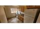 Functional kitchen with wooden cabinets, stainless steel sink, and white appliances at 3601 W 80Th Ave, Westminster, CO 80031