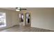 Inviting living room with modern laminate flooring, open layout, and seamless transition to the kitchen at 3601 W 80Th Ave, Westminster, CO 80031